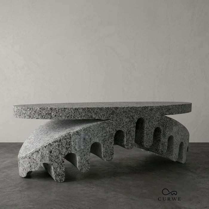 Luxury stone furniture: granite coffee table on an arched, ribbed base