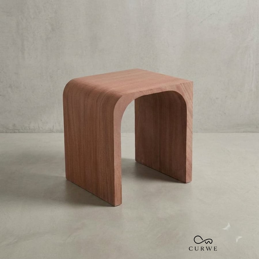 Bend red sandstone waterfall side table with an arched leg