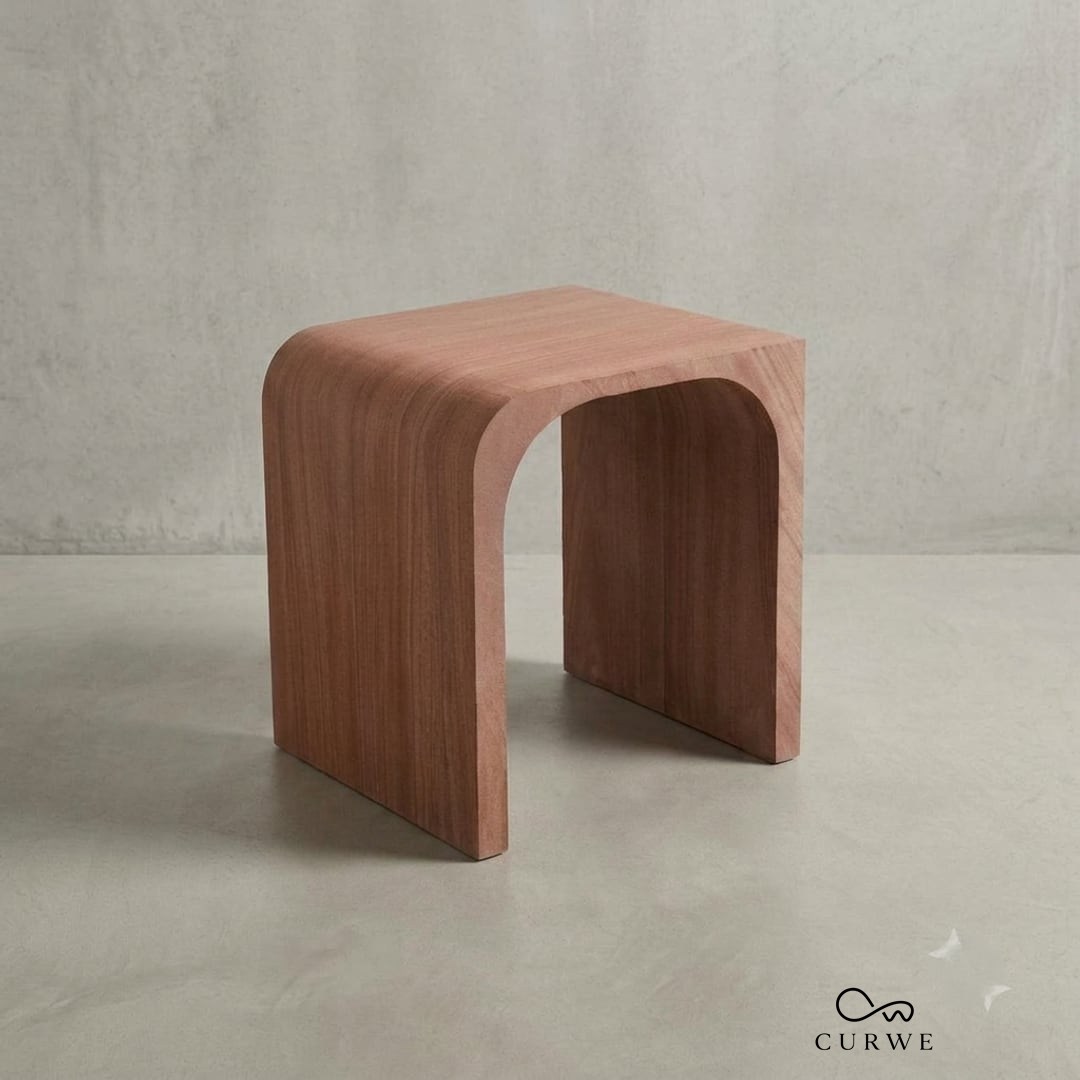Bend red sandstone waterfall side table with an arched leg
