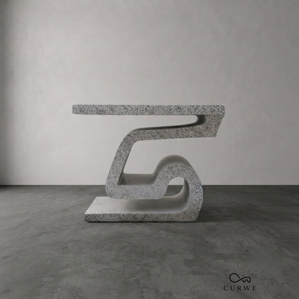 Flex granite coffee table on a sculptural S-curve leg