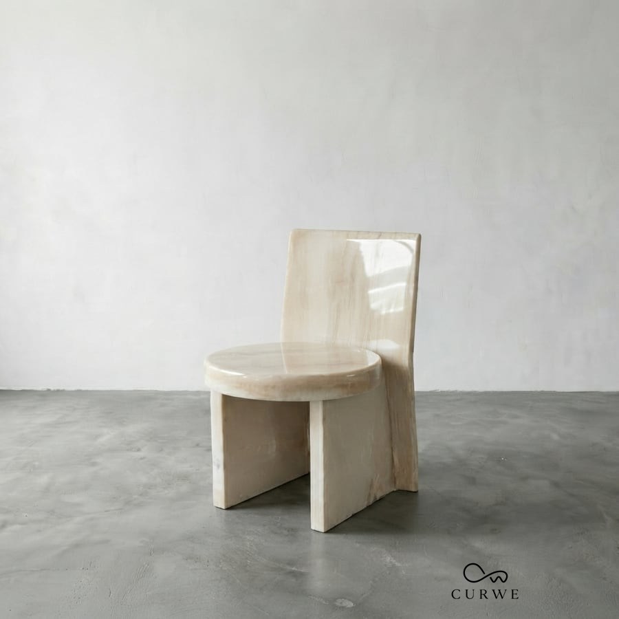 Moon sandstone chairs with crescent-curved backrests
