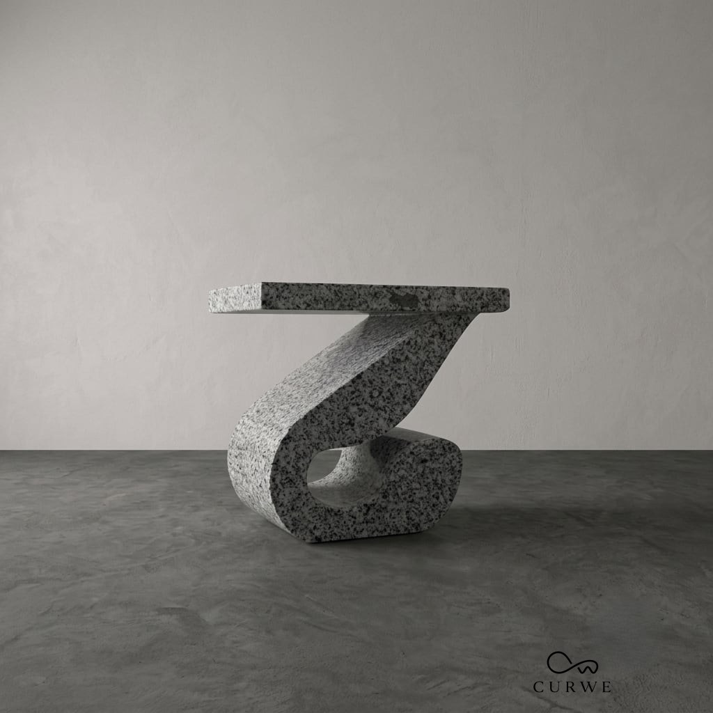 Zig granite coffee table with a zig-zag angled leg